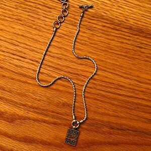 Lois Hill vintage silver neckace with rectangular pendant.